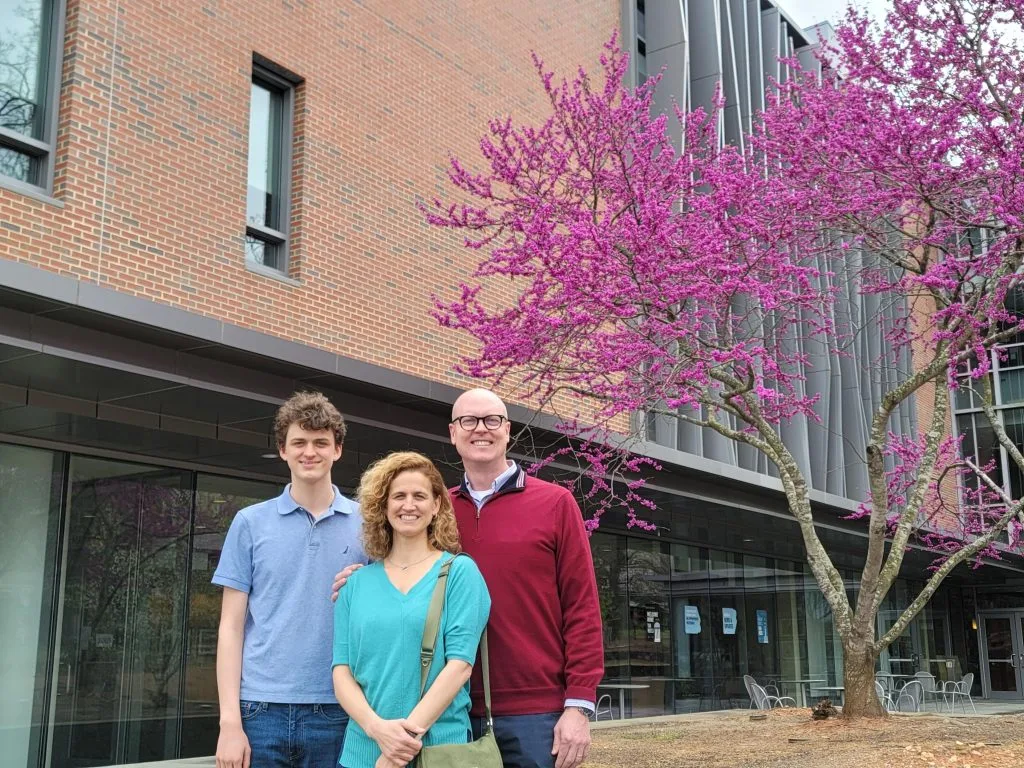 Craig Silliman with his family outside the FedEx Global Education Center